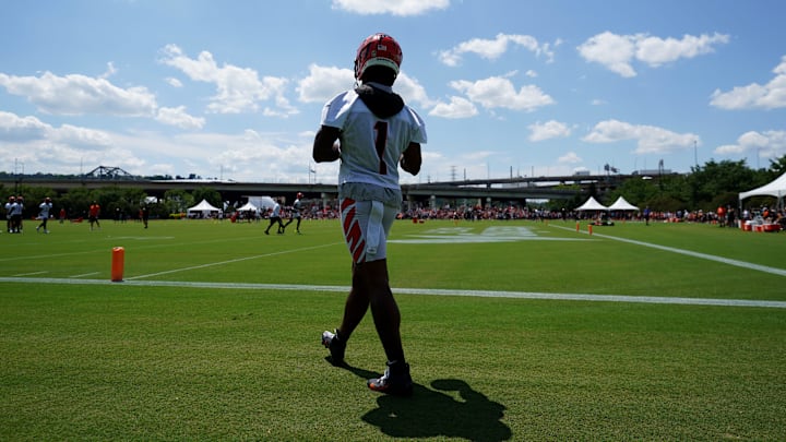 Cincinnati Bengals wide receiver Ja'Marr Chase (1) walks back for another repetition of a drill during NFL training camp practice, Monday, July 31, 2023, in Cincinnati.