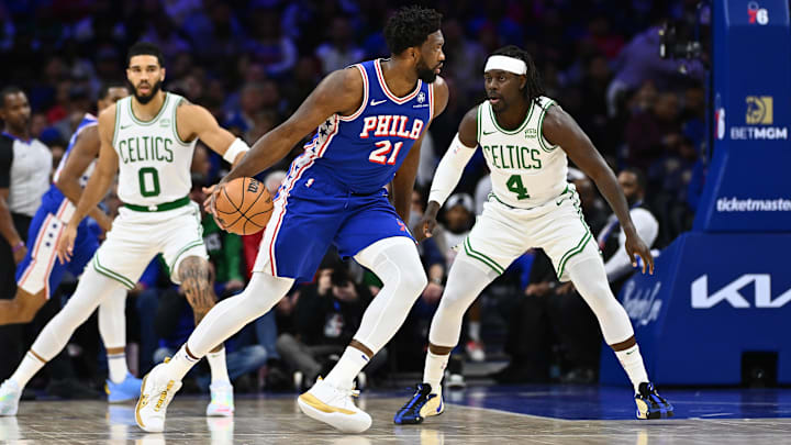 Nov 8, 2023; Philadelphia, Pennsylvania, USA; Philadelphia 76ers center Joel Embiid (21) controls the ball against Boston Celtics guard Jrue Holiday (4) in the first quarter at Wells Fargo Center. Mandatory Credit: Kyle Ross-Imagn Images