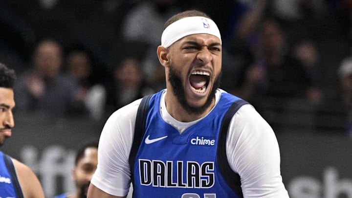 Jan 9, 2025; Dallas, Texas, USA; Dallas Mavericks center Daniel Gafford (21) celebrates during the game between the Dallas Mavericks and the Portland Trail Blazers at the American Airlines Center. Mandatory Credit: Jerome Miron-Imagn Images