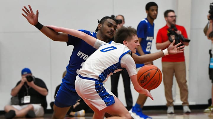 Darren Gray (3) of Wyoming forces a Maysville turnover at the boys OHSAA Division IV basketball state semifinals, Wittenberg University, March 14, 2025.