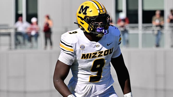 Oct 12, 2024; Amherst, Massachusetts, USA; Missouri Tigers defensive end Zion Young (9) lines up against the Massachusetts Minutemen during the second half at Warren McGuirk Alumni Stadium. Mandatory Credit: Eric Canha-Imagn Images Oct 12, 2024; Amherst, Massachusetts, USA; Missouri Tigers defensive end Zion Young (9) lines up against the Massachusetts Minutemen during the second half at Warren McGuirk Alumni Stadium. Mandatory Credit: Eric Canha-Imagn Images
