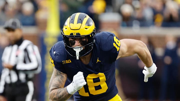 Nov 23, 2024; Ann Arbor, Michigan, USA;  Michigan Wolverines tight end Colston Loveland (18) runs a route against the Northwestern Wildcats at Michigan Stadium. Mandatory Credit: Rick Osentoski-Imagn Images