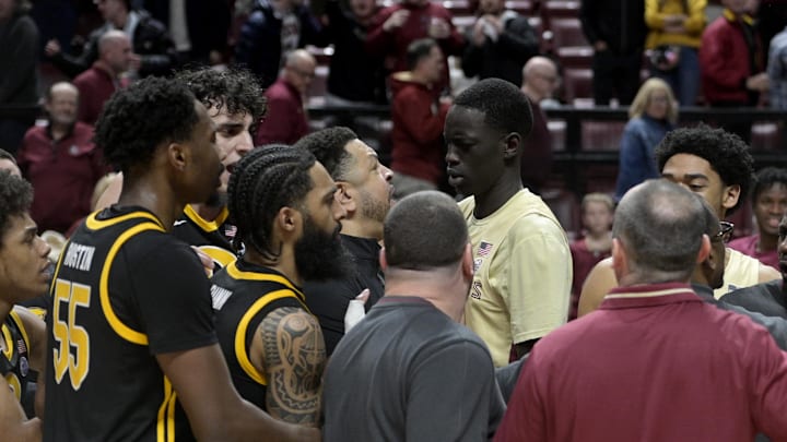 Jan 15, 2025; Tallahassee, Florida, USA; Florida State Seminoles and Pittsburgh Panthers players react after the game at Donald L. Tucker Center. Mandatory Credit: Melina Myers-Imagn Images Jan 15, 2025; Tallahassee, Florida, USA; Florida State Seminoles and Pittsburgh Panthers players react after the game at Donald L. Tucker Center. Mandatory Credit: Melina Myers-Imagn Images