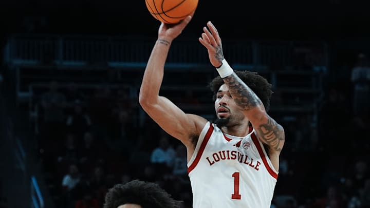 Louisville's J'Vonne Hadley (1) shoots against Duke during their game at the KFC Yum! Center in Louisville, Ky. on Dec. 8, 2024.