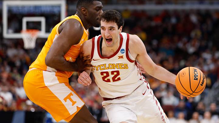 Mar 27, 2026; Chicago, IL, USA; Iowa State Cyclones forward Milan Momcilovic (22) drives the ball against Tennessee Volunteers forward Jaylen Carey (23) in the first half during a Sweet Sixteen game of the Midwest Regional of the men's 2026 NCAA Tournament at United Center. Mandatory Credit: Kamil Krzaczynski-Imagn Images