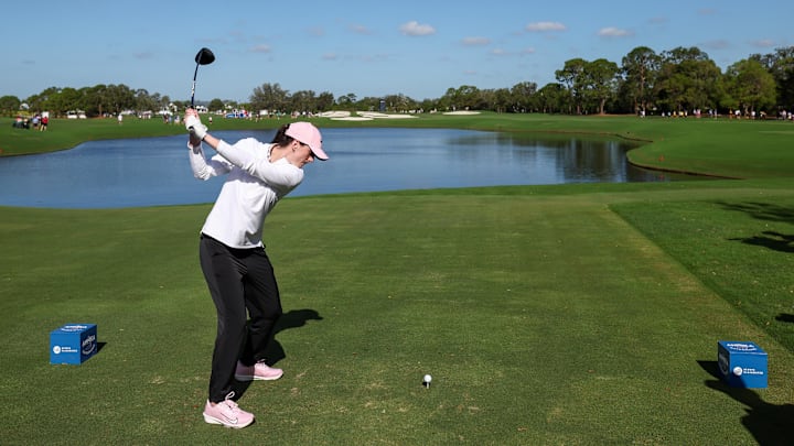 Caitlin Clark tees off during a 2024 pro-am.