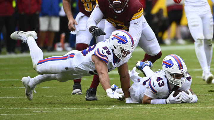 Sep 24, 2023; Landover, Maryland, USA; Buffalo Bills linebacker Terrel Bernard (43) recovers a fumble against the Washington Commanders during the second half at FedExField. Sep 24, 2023; Landover, Maryland, USA; Buffalo Bills linebacker Terrel Bernard (43) recovers a fumble against the Washington Commanders during the second half at FedExField.