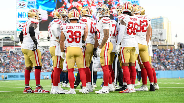San Francisco 49ers huddle against the Tennessee Titans