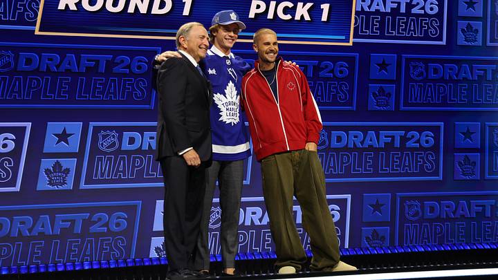 Jun 26, 2026; Buffalo, New York, USA; Gavin McKenna poses with NHL commissioner Gary Bettman and singer Justin Bieber after being selected with the first pick in the first round of the 2026 NHL Draft by the Toronto Maple Leafs at KeyBank Center. Mandatory Credit: Timothy T. Ludwig-Imagn Images