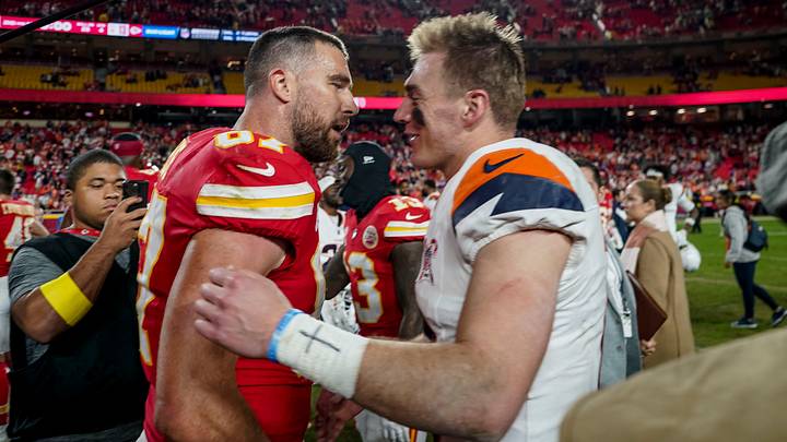 Dec 25, 2025; Kansas City, Missouri, USA; Denver Broncos quarterback Bo Nix (10) and Kansas City Chiefs tight end Travis Kelce (87) after the game at GEHA Field at Arrowhead Stadium. Mandatory Credit: Denny Medley-Imagn Images Dec 25, 2025; Kansas City, Missouri, USA; Denver Broncos quarterback Bo Nix (10) and Kansas City Chiefs tight end Travis Kelce (87) after the game at GEHA Field at Arrowhead Stadium. Mandatory Credit: Denny Medley-Imagn Images