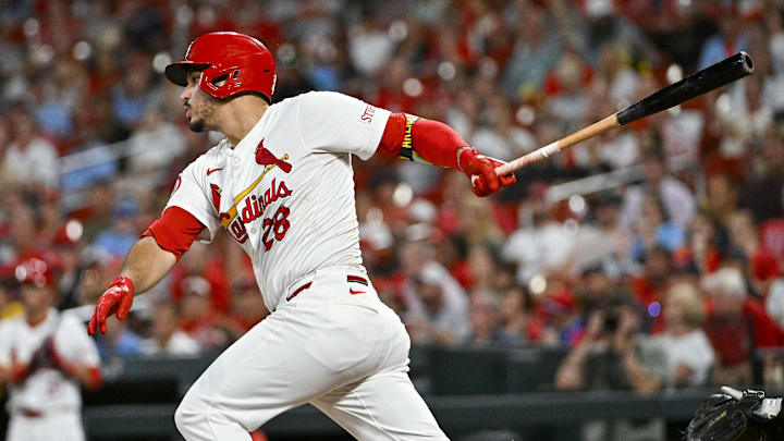 Sep 16, 2024; St. Louis, Missouri, USA;  St. Louis Cardinals third baseman Nolan Arenado (28) hits a one run single against the Pittsburgh Pirates during the fourth inning at Busch Stadium. Mandatory Credit: Jeff Curry-Imagn Images