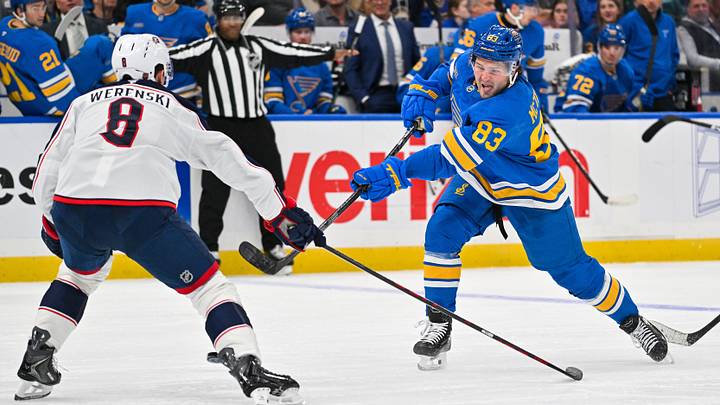 Oct 10, 2026; St. Louis, Missouri, USA; St. Louis Blues center Mason McTavish (83) shoots as Columbus Blue Jackets defenseman Zach Werenski (8) defends during the second period at Enterprise Center. Mandatory Credit: Jeff Curry-Imagn Images Oct 10, 2026; St. Louis, Missouri, USA; St. Louis Blues center Mason McTavish (83) shoots as Columbus Blue Jackets defenseman Zach Werenski (8) defends during the second period at Enterprise Center. Mandatory Credit: Jeff Curry-Imagn Images