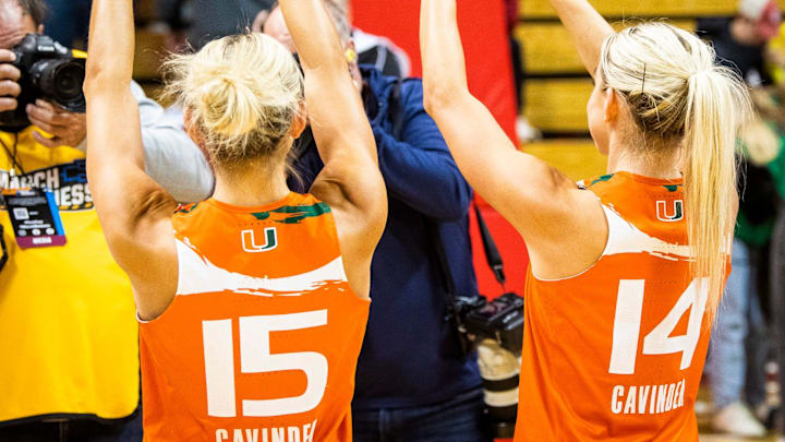 Miami (FL)'s Hanna Cavinder (15) and Haley Cavinder (14) makes the \"U\" sign after the second half of the NCAA Tournament Second Round game between Indiana and Miami (FL) at Simon Skjodt Assembly Hall on Monday, March 20, 2023.

Iu Um Wbb 2h Cavinder Twins Celebrate