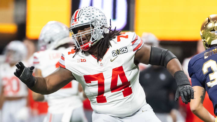 Jan 20, 2025; Atlanta, GA, USA; Ohio State Buckeyes offensive lineman Donovan Jackson (74) against the Notre Dame Fighting Irish during the CFP National Championship college football game at Mercedes-Benz Stadium. Mandatory Credit: Mark J. Rebilas-Imagn Images