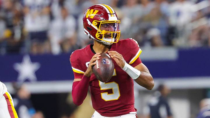 Washington Commanders quarterback Jayden Daniels (5) throws during the game against the Dallas Cowboys at AT&T Stadium. Mandatory Credit: Kevin Jairaj-Imagn Images