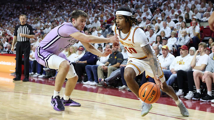 Feb 1, 2025; Ames, Iowa, USA; Kansas State Wildcats guard Brendan Hausen (11) defends Iowa State Cyclones guard Keshon Gilbert (10) during the first half at James H. Hilton Coliseum. Mandatory Credit: Reese Strickland-Imagn Images Feb 1, 2025; Ames, Iowa, USA; Kansas State Wildcats guard Brendan Hausen (11) defends Iowa State Cyclones guard Keshon Gilbert (10) during the first half at James H. Hilton Coliseum. Mandatory Credit: Reese Strickland-Imagn Images