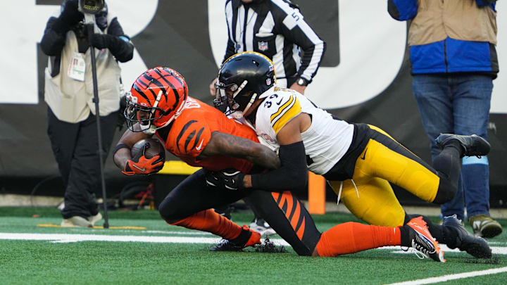 Bengals Ja'Marr Chase (1) pulls the defense with him as he heads down the field during their game against the Steelers at Paycor Stadium on Sunday December 1, 2024. Steelers won the game with a final score of 44-38.