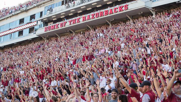 Arkansas Razorbacks fans "call the hogs" during the third quarter of the game against the Portland State Vikings at Donald W. Reynolds Razorback Stadium. Arkansas Razorbacks fans "call the hogs" during the third quarter of the game against the Portland State Vikings at Donald W. Reynolds Razorback Stadium.