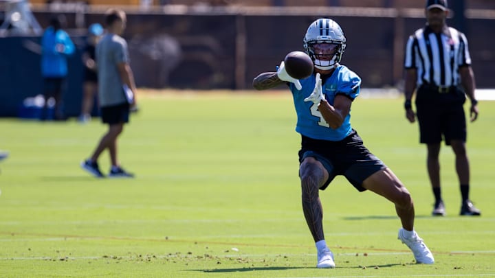 Jul 23, 2025; Charlotte, NC, USA; Carolina Panthers rookie wide receiver Tetairoa McMillan (4) catches a pass during training camp. Mandatory Credit: Scott Kinser-Imagn Images