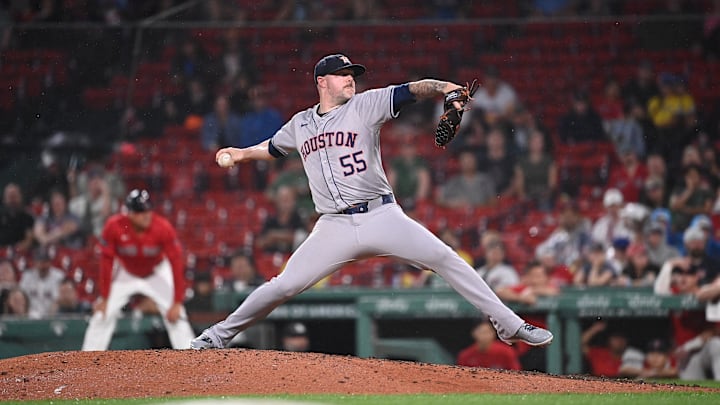 Aug 9, 2024; Boston, Massachusetts, USA; Houston Astros pitcher Ryan Pressly (55) pitches against the Boston Red Sox during the ninth inning at Fenway Park.