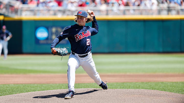 Jun 26, 2022; Omaha, NE, USA; Ole Miss pitcher Hunter Elliott (26) pitches during the first inning against the Oklahoma Sooners at Charles Schwab Field. Mandatory Credit: Jaylynn Nash-Imagn Images