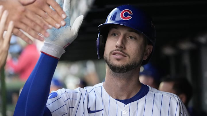 Oct 2, 2025; Chicago, Illinois, USA; Chicago Cubs outfielder Kyle Tucker (30) is greeted in the dugout after scoring against the San Diego Padres during game three of the Wildcard round for the 2025 MLB playoffs at Wrigley Field. Mandatory Credit: David Banks-Imagn Images Oct 2, 2025; Chicago, Illinois, USA; Chicago Cubs outfielder Kyle Tucker (30) is greeted in the dugout after scoring against the San Diego Padres during game three of the Wildcard round for the 2025 MLB playoffs at Wrigley Field. Mandatory Credit: David Banks-Imagn Images