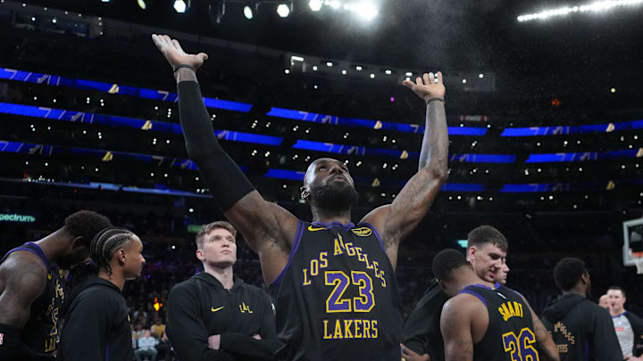 Mar 3, 2026; Los Angeles, California, USA; Los Angeles Lakers forward LeBron James (23) throws powdered chalk into the air before the game against the New Orleans Pelicans Crypto.com Arena. Mandatory Credit: Kirby Lee-Imagn Images