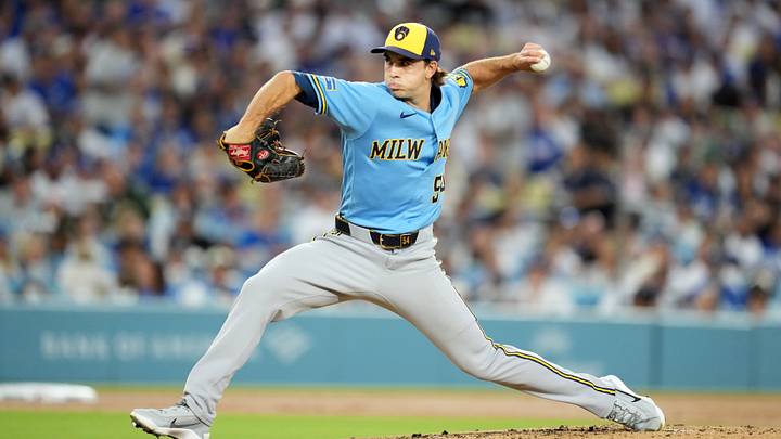Aug 14, 2026; Los Angeles, California, USA; Milwaukee Brewers pitcher Robert Gasser (54) throws against the Los Angeles Dodgers at Dodger Stadium. Mandatory Credit: Kirby Lee-Imagn Images