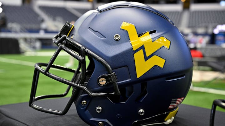 Jul 12, 2023; Arlington, TX, USA; A view of the West Virginia Mountaineers helmet and logo during Big 12 football media day at AT&T Stadium. Mandatory Credit: Jerome Miron-Imagn Images