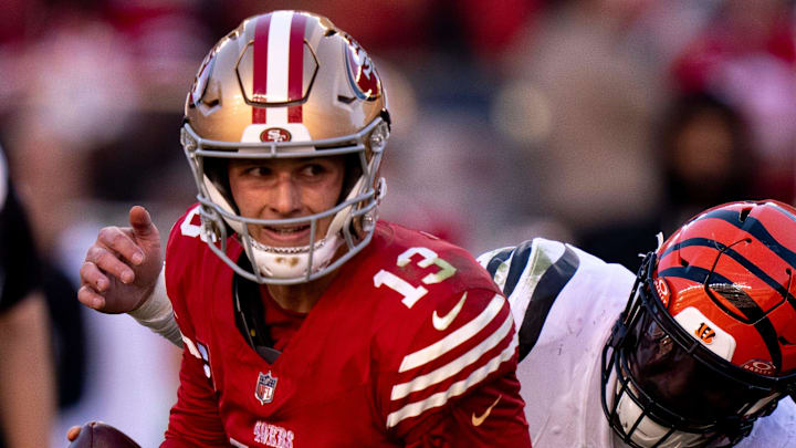 Cincinnati Bengals defensive end Trey Hendrickson (91) forces a fumble while sacking San Francisco 49ers quarterback Brock Purdy (13) in the fourth quarter of the NFL game between the Cincinnati Bengals and the San Francisco 49ers at Levi Stadium in Santa Clara, Calif., on Sunday, Oct 29, 2023.