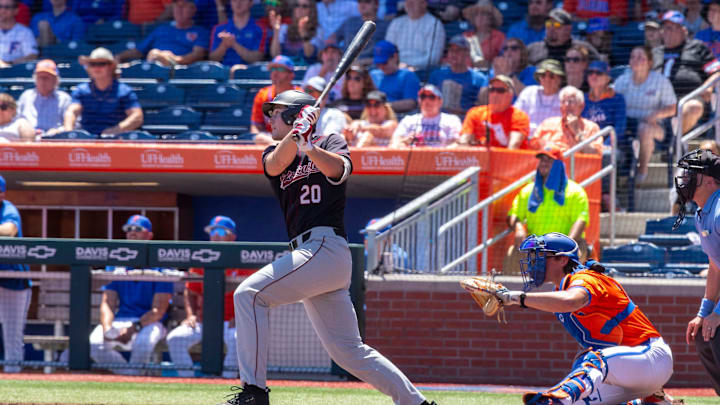 Gamecocks utility Ethan Petry (20) with a two run homer in the top of the third inning against Florida. The Gators ended their six game losing streak with an 11-9 win over the Gamecocks in Game 3 of the weekend series at Condron Family Ballpark in Gainesville, Florida, Sunday, April 14, 2024. [Cyndi Chambers/ Gainesville Sun] 2024