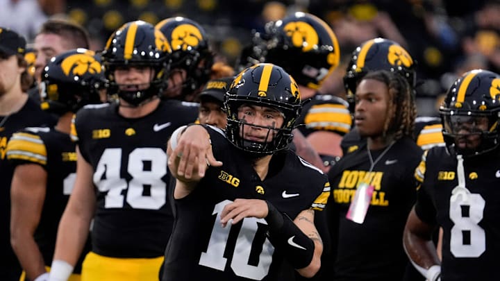 Iowa Hawkeyes quarterback Jeremy Hecklinski (10) throws a pass during warmups before a college football game against the Penn State Nittany Lions Oct. 18, 2025 at Kinnick Stadium in Iowa City, Iowa.