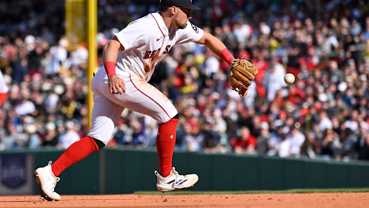 Apr 3, 2026; Boston, Massachusetts, USA; Boston Red Sox third baseman Caleb Durbin (5) makes a catch to end the seventh inning against the San Diego Padres at Fenway Park. Mandatory Credit: Eric Canha-Imagn Images
