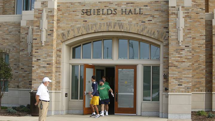 Players and staff walk out one of the doors of the new Shields Hall, home for the Notre Dame football team, before a practice Friday, Aug. 7, 2026, at the Irish Athletics Center in South Bend. Players and staff walk out one of the doors of the new Shields Hall, home for the Notre Dame football team, before a practice Friday, Aug. 7, 2026, at the Irish Athletics Center in South Bend.