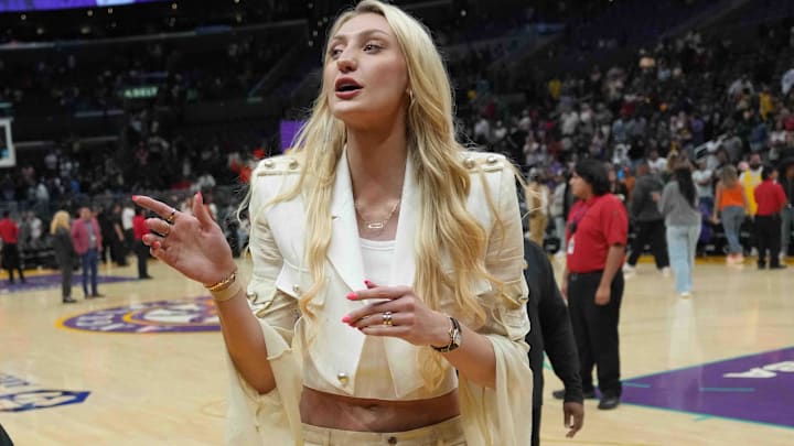LA Sparks injured forward Cameron Brink leaves the floor after the game against the Las Vegas Aces at Crypto.com Arena.