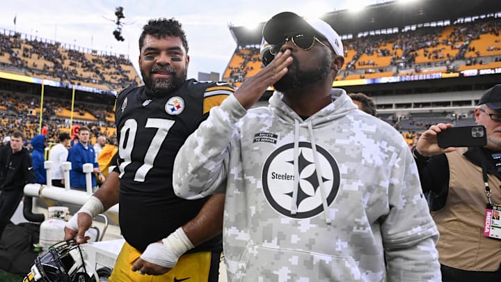 Nov 17, 2024; Pittsburgh, Pennsylvania, USA; Pittsburgh Steelers head coach Mike Tomlin and defensive tackle Cameron Heyward (97)  celebrate a 18-16 victory over the Baltimore Ravens at Acrisure Stadium. Mandatory Credit: Barry Reeger-Imagn Images