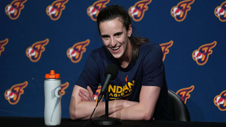 Indiana Fever guard Caitlin Clark (22) talks to media members before the game against the Golden State Valkyries.