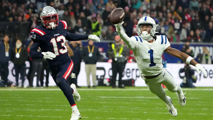 Nov 12, 2023; Frankfurt, Germany; Indianapolis Colts wide receiver Josh Downs (1) attempts to catch the ball against New England Patriots cornerback Jack Jones (13) in the first half during an NFL International Series game at Deutsche Bank Park.