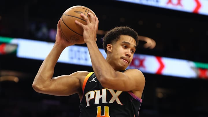 Apr 9, 2025; Phoenix, Arizona, USA; Phoenix Suns center Oso Ighodaro (4) against the Oklahoma City Thunder at Footprint Center. Mandatory Credit: Mark J. Rebilas-Imagn Images