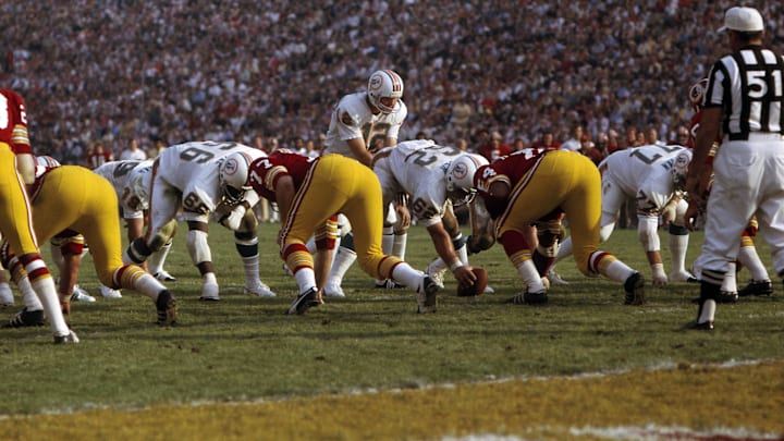 Miami Dolphins quarterback Bob Griese (12) in action against the Washington Redskins in Super Bowl VII at the Los Angeles Coliseum. The Dolphins defeated the Redskins 14-7 completing a 17-0 undefeated season.