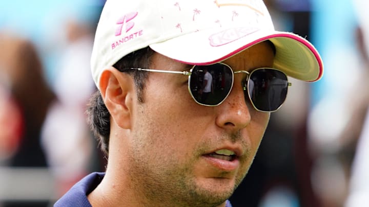 May 5, 2024; Miami Gardens, Florida, USA; Red Bull Racing driver Sergio Perez (11) arrives in the paddock before the Miami Grand Prix at Miami International Autodrome. Mandatory Credit: John David Mercer-USA TODAY Sports