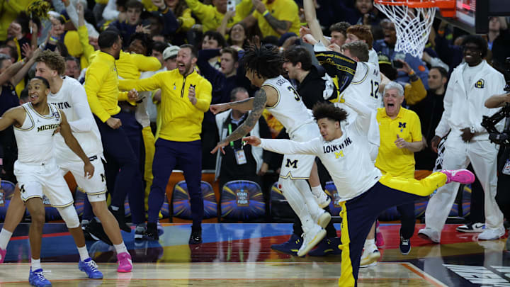 Michigan celebrates their national championship win over UConn.
