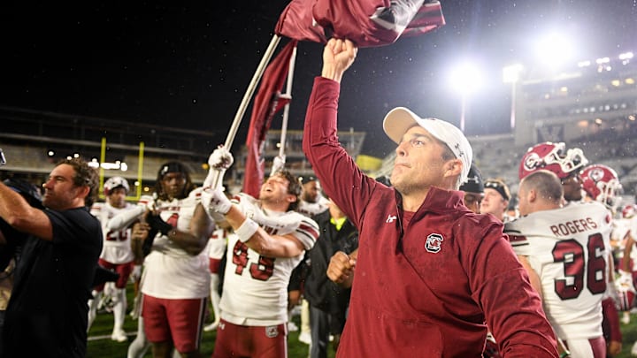 Nov 9, 2024; Nashville, Tennessee, USA;  South Carolina Gamecocks head coach Shane Beamer and his team celebrate the win with their fans against the Vanderbilt Commodores during the second half at FirstBank Stadium. Mandatory Credit: Steve Roberts-Imagn Images