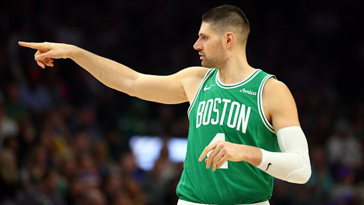 Feb 24, 2026; Phoenix, Arizona, USA; Boston Celtics center Nikola Vucevic (4) reacts against the Phoenix Suns in the first half at Mortgage Matchup Center. Mandatory Credit: Mark J. Rebilas-Imagn Images