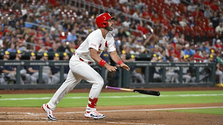 Aug 20, 2024; St. Louis, Missouri, USA;  St. Louis Cardinals pinch hitter Matt Carpenter (13) hits a two run home run against the Milwaukee Brewers during the eighth inning at Busch Stadium. Mandatory Credit: Jeff Curry-Imagn Images