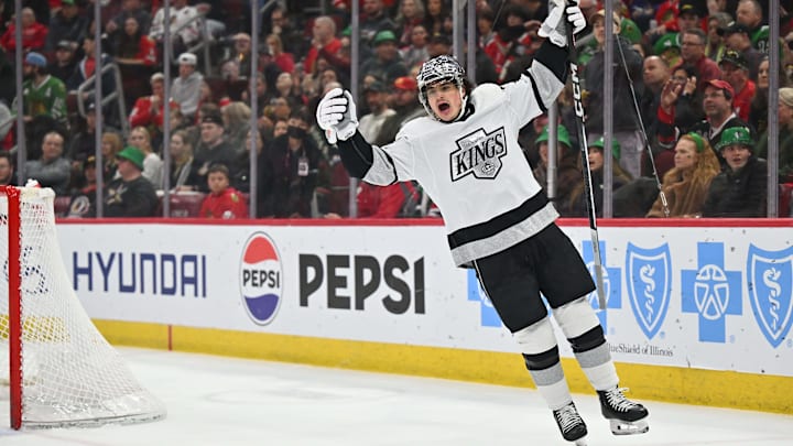 Mar 15, 2024; Chicago, Illinois, USA; Los Angeles Kings forward Alex Turcotte (38) celebrates after teammate forward Alex Laferriere (78) scores a goal in the first period against the Chicago Blackhawks at United Center. Mandatory Credit: Jamie Sabau-Imagn Images