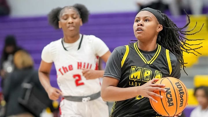A Memphis Business Academy (Tenn.) player goes up for a shot during a 55-46 win at Center Hill (Ms.) on Dec. 21, 2024