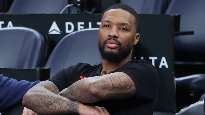 Oct 29, 2025; Salt Lake City, Utah, USA; Portland Trail Blazers guard Damian Lillard (0) watches the team warm up before the game against the Utah Jazz at Delta Center. Mandatory Credit: Rob Gray-Imagn Images Oct 29, 2025; Salt Lake City, Utah, USA; Portland Trail Blazers guard Damian Lillard (0) watches the team warm up before the game against the Utah Jazz at Delta Center. Mandatory Credit: Rob Gray-Imagn Images
