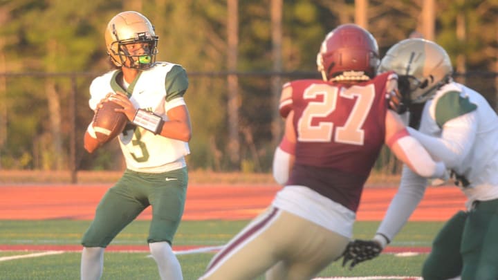 Bishop Hendricken quarterback Isaiah Brito (3) looks to throw a pass against Killingly on Sept. 12, 2025.