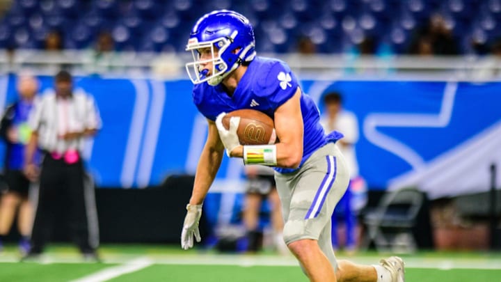 Detroit Catholic Central's Jaden Pydyn rushes during the 52nd annual Prep Bowl on Saturday, Oct. 27, 2024, at Ford Field in Detroit.
